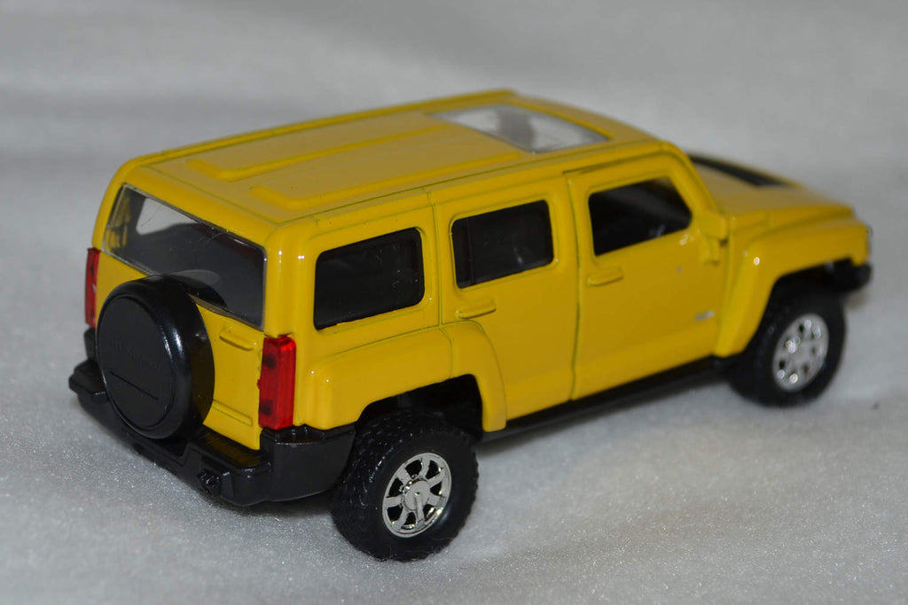 Hummer H3 Gul 1:34, 1:39 Welly Nex Pullback Ny