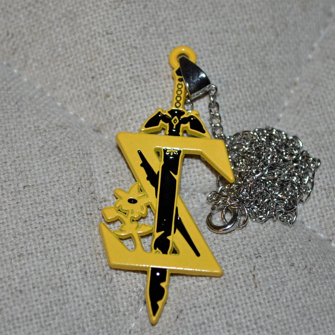 Zelda Logo m. Svärd Gul/Svart Halsband (Legend of) 5*2cm Ny