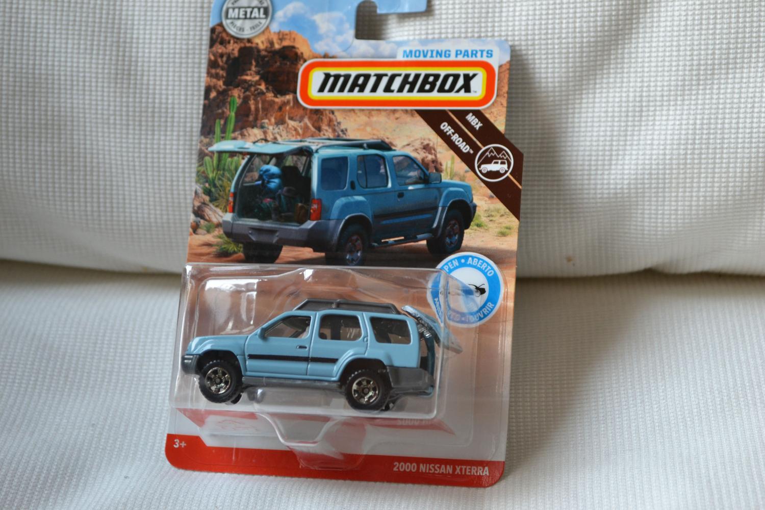 2000 Nissan Xterra Blå 1:64 Matchbox (Roadtrip Series, Öppningsbara) 6-8cm Ny