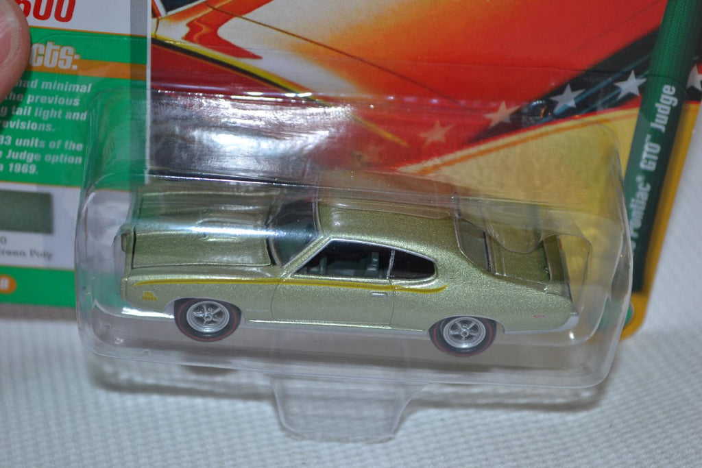 1969 Pontiac GTO Judge Guld 1:64 Johnny Lightning (Muscle 19B USA) 7-8cm Ny