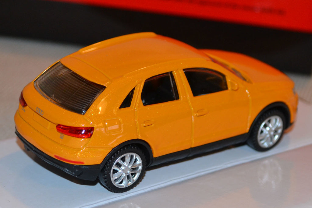Audi Q3 Orange 1:43 (Rastar) Ny