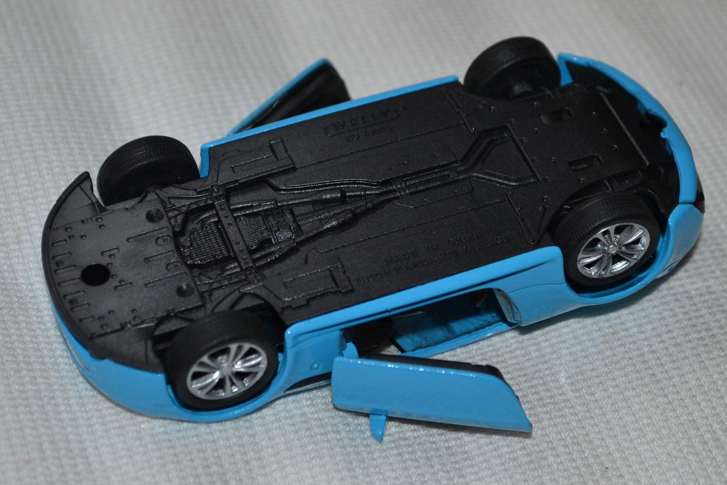 Aston Martin V12 Vantage Ljusblå 1:34-1:38 Welly 11cm Pullback Ny