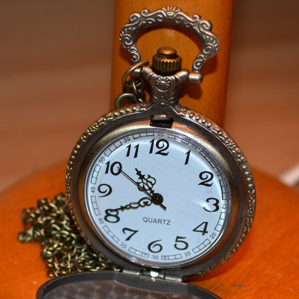 Piratansikte m. Insjunkning, Motsatta Svärd Fickur Klocka Br