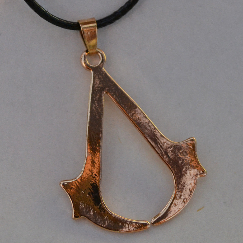 Assassin's Creed Logo Stilren Halsband Guld Plätering Ny